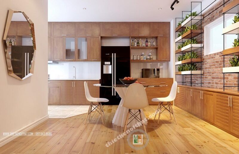 Mẫu thiết kế phòng ăn chung cư đẹp với bộ bàn ăn đơn giản nhỏ gọn kết hợp hệ tủ bếp gỗ công nghiệp cao cấp mang đến không gian phòng ăn lí tưởng