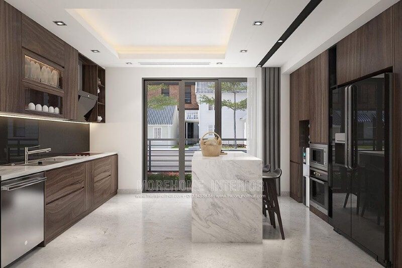 Sắp xếp phòng bếp hiện đại khoa học bước tới tủ lạnh để đồ trên bàn đảo, với không gian rộng cả nhà có thể phụ giúp, bồn rửa gần bếp nấu, khi xong bạn có thể quay ra bày trí thỏa mái từ chiếc bàn đảo của mình.