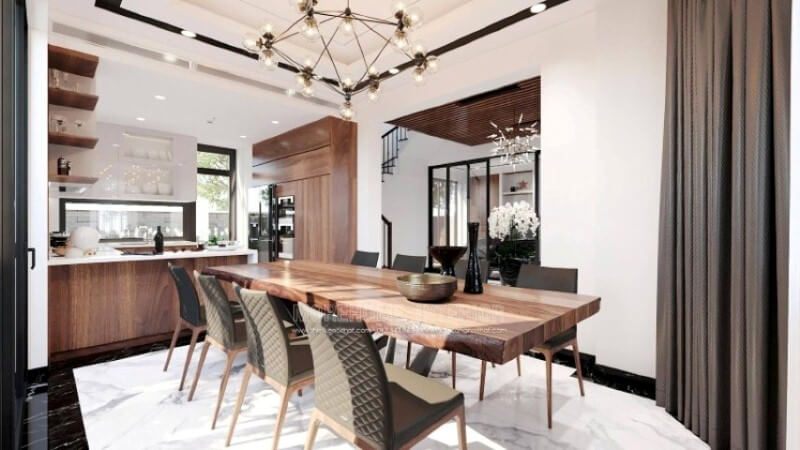Ngoài điểm đặc biệt từ cách bố trí kệ trang trí, bàn đảo bằng đá nhân tạo màu trắng được thiết kế phô ra ngoài lại là điểm đáng chú ý, một mặt vẫn đảm bảo diện tích để chủ nhân có thể phô diễn món ăn thỏa mái, một mặt bạn lại có thể vừa nội trợ vừa có thể để mắt con học một cách dễ dàng.